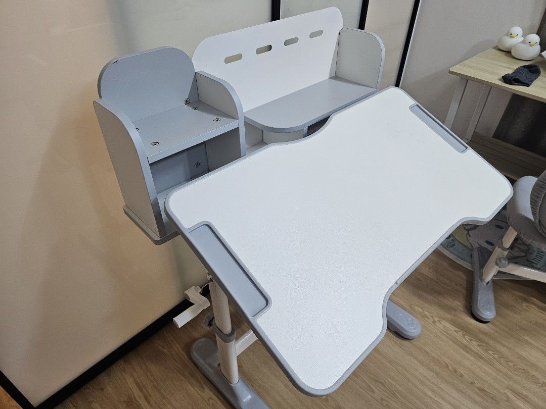 Study Table (Category: Tables & Sets) located in Singapore. Submitted by theman78 (Listing ID 1364536891, Image 2). Description: children study table adjustable height table can be tilted 80cm width Some cosmetic defects during delivery.