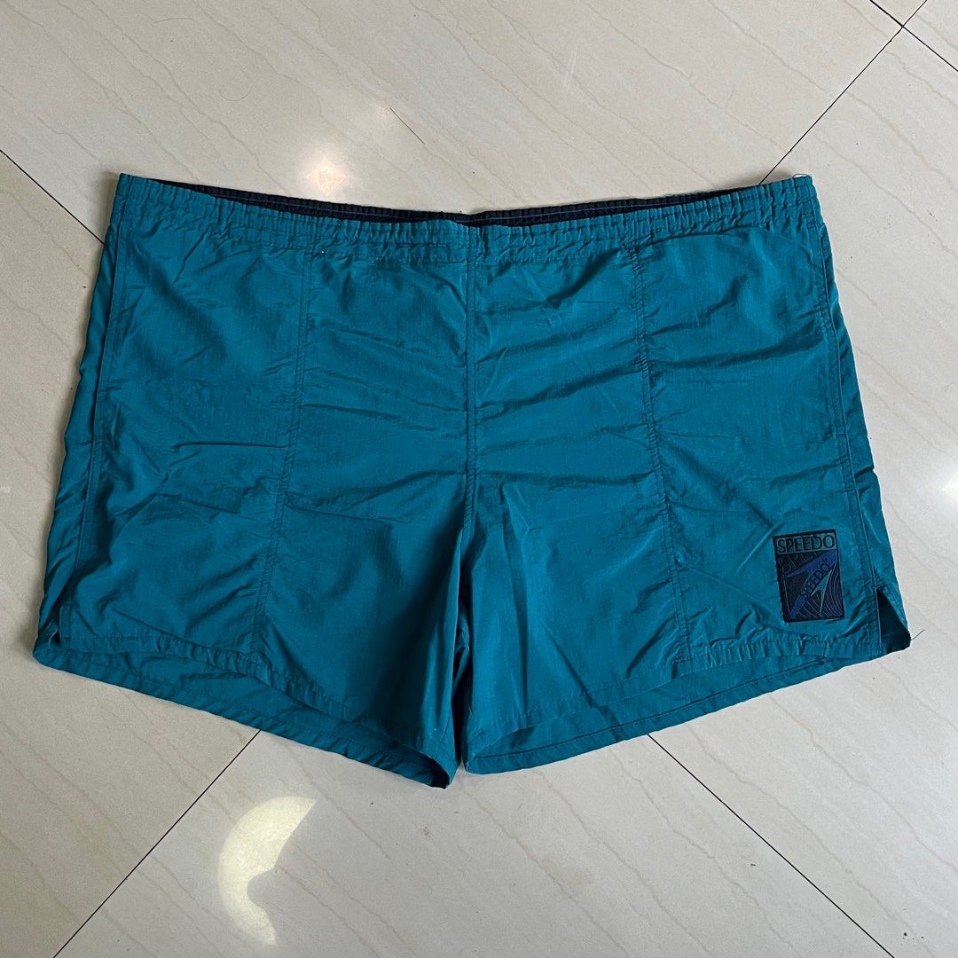 (Thrifted) Speedo Trunk/Shorts - Turquoise (Plus Size) (Category: Shorts) located in Ozamiz City. Submitted by thriftrevival (Listing ID 1364419637, Image 1). Description: Stand out in this rare vintage Speedo trunk-style shorts in a vibrant turquoise hue! Originally designed for swimming, but stylish and sturdy enough to wear as everyday shorts. No garter anymore, but it still has a functional adjustable string inside for a comfy fit. This piece
