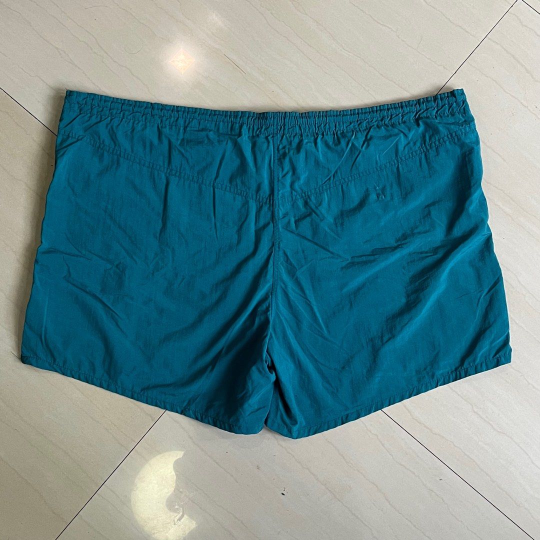 (Thrifted) Speedo Trunk/Shorts - Turquoise (Plus Size) (Category: Shorts) located in Ozamiz City. Submitted by thriftrevival (Listing ID 1364419637, Image 2). Description: Stand out in this rare vintage Speedo trunk-style shorts in a vibrant turquoise hue! Originally designed for swimming, but stylish and sturdy enough to wear as everyday shorts. No garter anymore, but it still has a functional adjustable string inside for a comfy fit. This piece