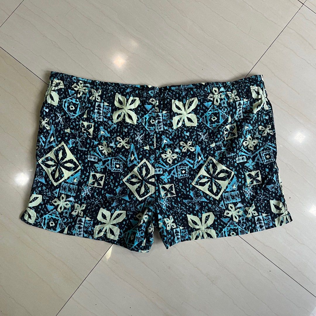 (Thrifted) Vintage Givenchy Shorts/Trunks - (Plus Size) (Category: Shorts) located in Ozamiz City. Submitted by thriftrevival (Listing ID 1364421526, Image 2). Description: This rare vintage piece from Givenchy features a bold tribal-inspired print in shades of black, teal, and cream — perfect for standing out whether you’re at the beach or styling it for everyday wear. Designed for a plus-size fit, these shorts are made from super durable vintag