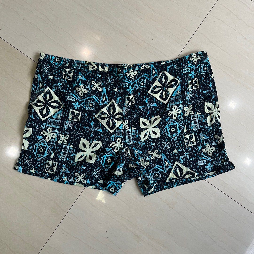 (Thrifted) Vintage Givenchy Shorts/Trunks - (Plus Size) (Category: Shorts) located in Ozamiz City. Submitted by thriftrevival (Listing ID 1364421526, Image 1). Description: This rare vintage piece from Givenchy features a bold tribal-inspired print in shades of black, teal, and cream — perfect for standing out whether you’re at the beach or styling it for everyday wear. Designed for a plus-size fit, these shorts are made from super durable vintag