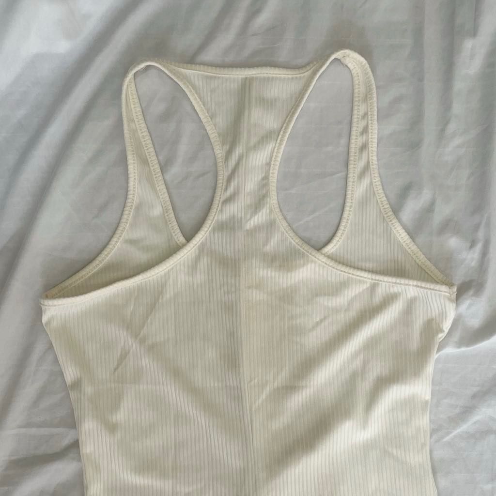 White ribbed tank top with racerback playsuit (Category: Undergarments & Loungewear) located in Quezon City. Submitted by HannoCollection (Listing ID 1364487537, Image 3). Description: Never been used. Freesize, but best fits M to semi-large frames Waistline: 27 inches Length (from shoulder): 32 inches ✔️ ACTUAL PHOTOS POSTED ✔️ COD Available (with additional 10% fee) ✔️ MOP: GCash or Landbank, ꜱʜᴏᴘᴇᴇ checkout (SCO for delivery) ✔️ same day deliv