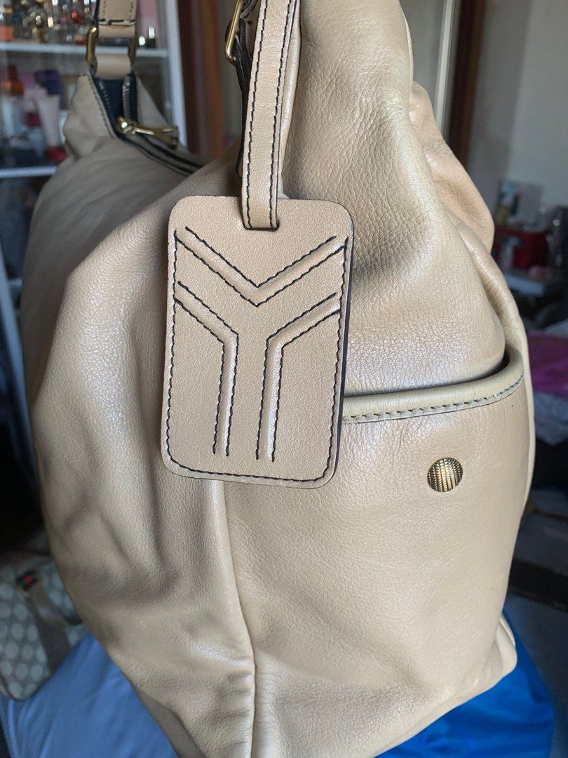 YSL tote original (Category: Luxury Bags & Wallets) located in Manila. Submitted by yanakolekzione (Listing ID 1364522139, Image 2). Description: Original preloved Color: Beige Size: medium to large This is preloved please expect signs of usage .