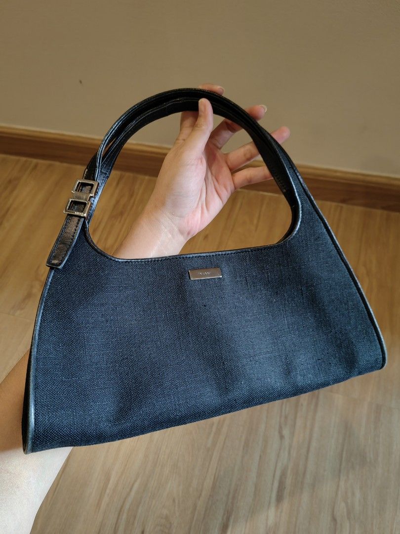 💯 Authentic GUCCI Black Linen Boat Shoulder Bag (Category: Luxury Bags & Wallets) located in Taguig. Submitted by cathiecute (Listing ID 1361620213, Image 2). Description: •💯💯💯 Authentic bought from Japan. 🇯🇵 •Black Leather on the inside and outside lining of the bag •Money back guaranteed 💯👌 •Only the bag, no other inclusions.
