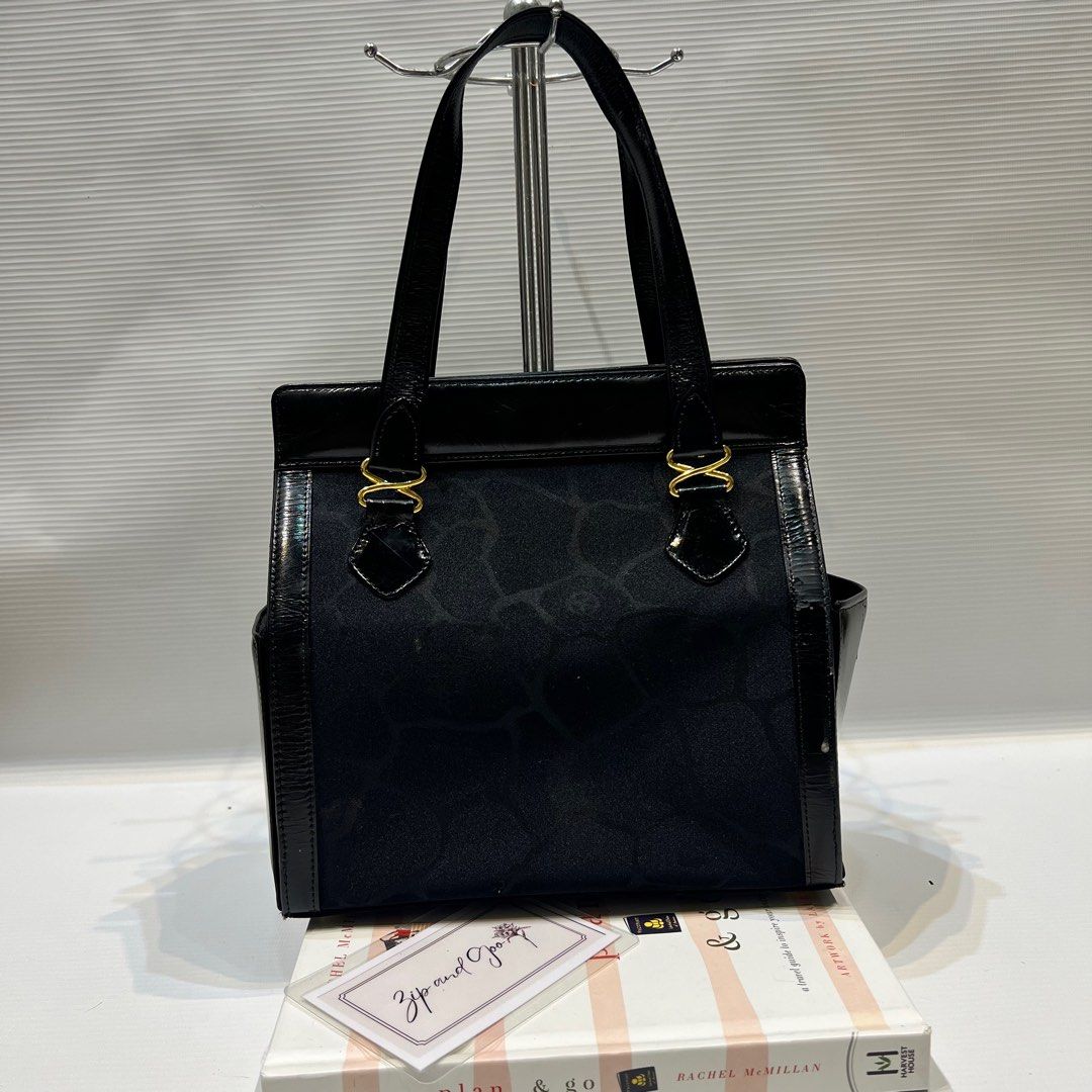 AUTH MOSCHINO BOX TYPE BAG (Category: Luxury Bags & Wallets) located in Manila. Submitted by zipandgoo (Listing ID 1361608753, Image 2). Description: Authentic 💯 In good used condition Clean inside and out Pretty in actual 💌.