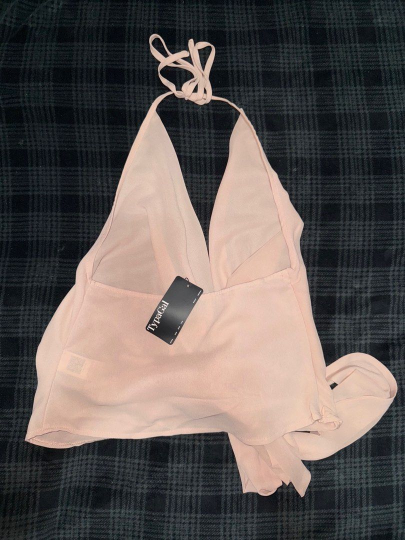 Backless halter top (Category: Sleeveless) located in Talisay. Submitted by bilchecomedia (Listing ID 1361584312, Image 2). Description: Never been worn With tag Sise s but fits s-l.