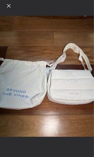 Beyond the vines poofy bag