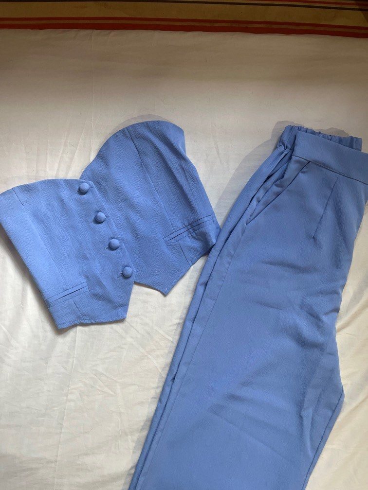 blue tube set coordinates (Category: Sets or Coordinates) located in Cainta. Submitted by arideclutter (Listing ID 1361535891, Image 1). Description: Size: One size Recommended for frames: SMALL to MEDIUM Dimensions when laid flat: top: front length 11" back length 7" armpit to armpit 14" (fully smocked back, fits up to 35" bust) with functional buttons cropped fit pants: length 38" waist 12" (garterized back, fits up to 28") with pockets with fr