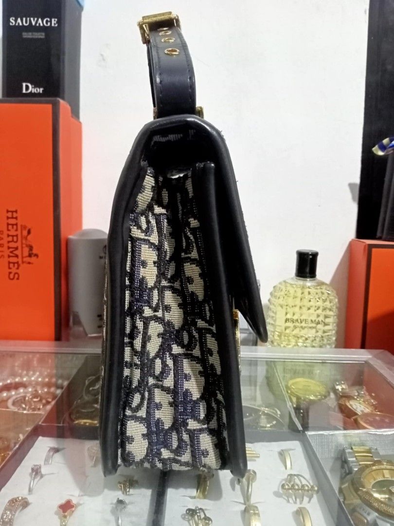 Christian Dior (Category: Luxury Bags & Wallets) located in Bayombong. Submitted by kweeeen (Listing ID 1361548568, Image 2). Description: Christian Dior 30th Montaigne coded with sling slightly negotiable.