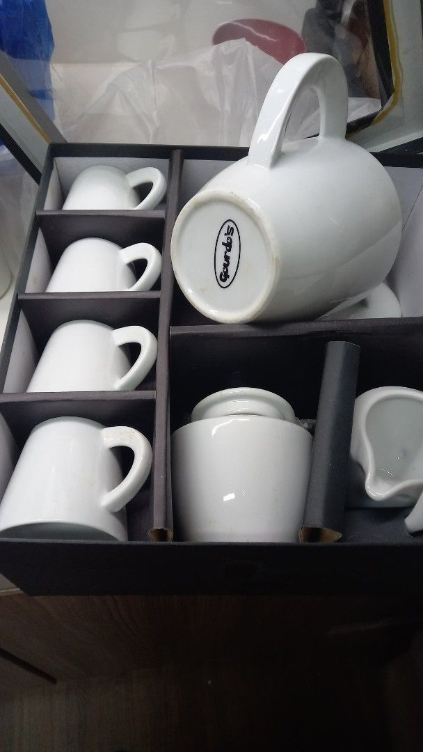 Gourdo's teapot set (Category: Coffee & Tea Tableware) located in Manila. Submitted by miss66449 (Listing ID 1361548656, Image 3). Description: ceramic teapot, milk & sugar jar, with teacups. never use, kept in cabinet. rfs: moving out , I still have other teacup set..