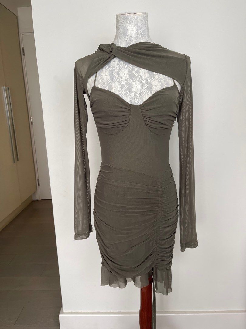 Green cut-out dress (Category: Dresses) located in Makati City. Submitted by secondmuse_ (Listing ID 1361515591, Image 1). Description: .