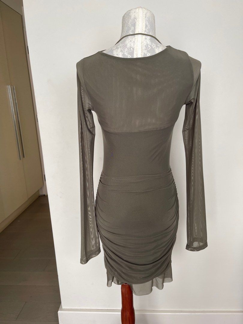 Green cut-out dress (Category: Dresses) located in Makati City. Submitted by secondmuse_ (Listing ID 1361515591, Image 3). Description: .