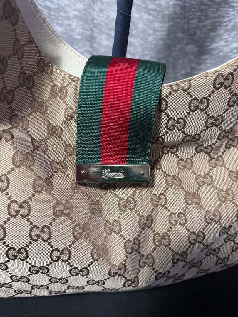 Vintage gucci hobo bag (Category: Luxury Bags & Wallets) located in Pasay City. Submitted by .alittleluxury (Listing ID 1361546366, Image 2). Description: Vintage Gucci canvas and leather web hobo bag large (Bag only).