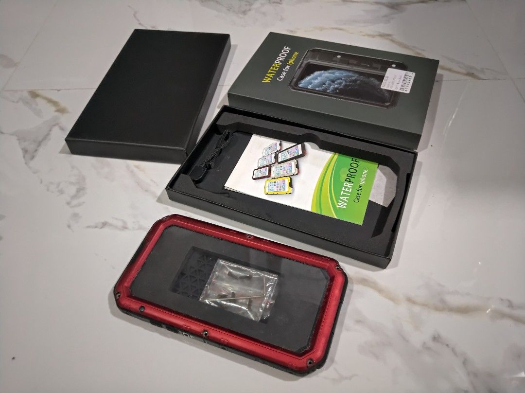 Waterproof Shockproof iPhone 11 Case (Red) (Category: Cases & Sleeves) located in General Trias. Submitted by mervcorner (Listing ID 1361601442, Image 2). Description: Bought around 1k+. Certified Waterproof and Shockproof. Full coverage case compatible only with iPhone 11. De tornillo sya comes with mini tools. Maybe you need this to protect your unit from any damage mas maigi ng mag invest sa case kesa masiraan ng iphone at magastusan sa pag pa