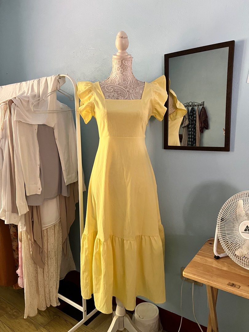 Yellow ruffled mid long summer dress (Category: Dresses) located in Manila. Submitted by ginibib (Listing ID 1361523631, Image 1). Description: Not my size. Tag says xs but this is actually for a medium body built. Flawless condition. .
