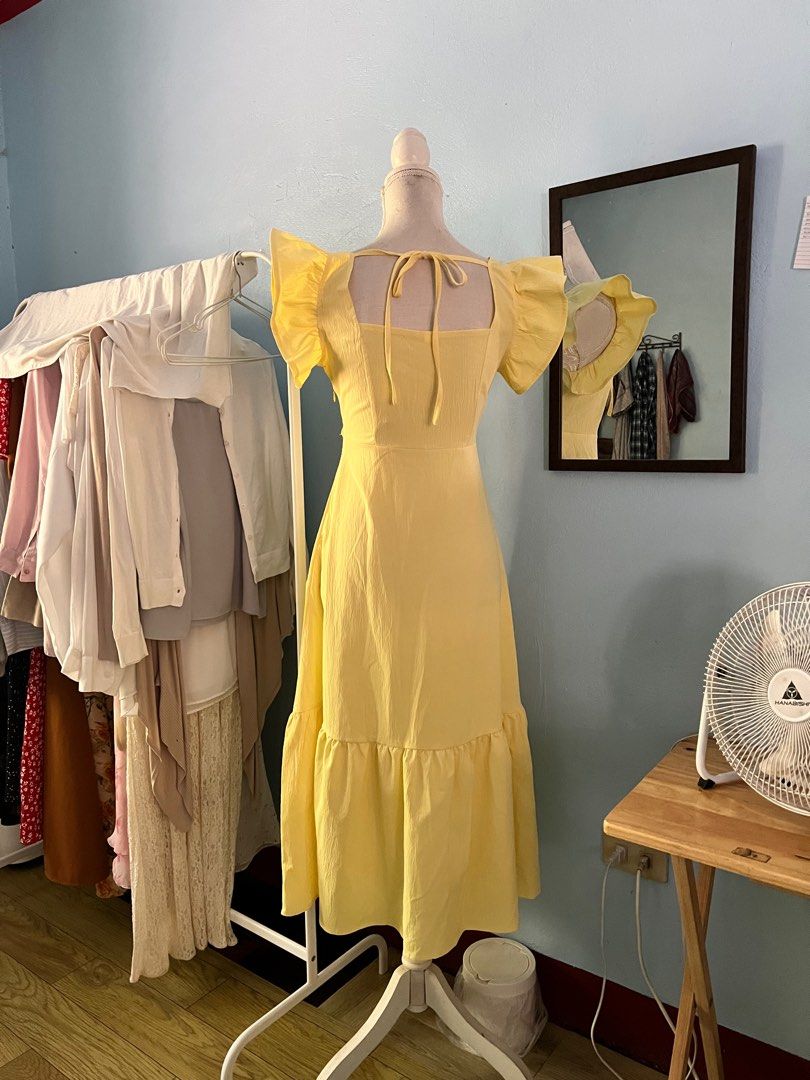 Yellow ruffled mid long summer dress (Category: Dresses) located in Manila. Submitted by ginibib (Listing ID 1361523631, Image 2). Description: Not my size. Tag says xs but this is actually for a medium body built. Flawless condition. .