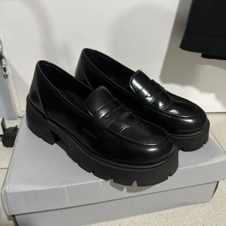 Black leather loafers