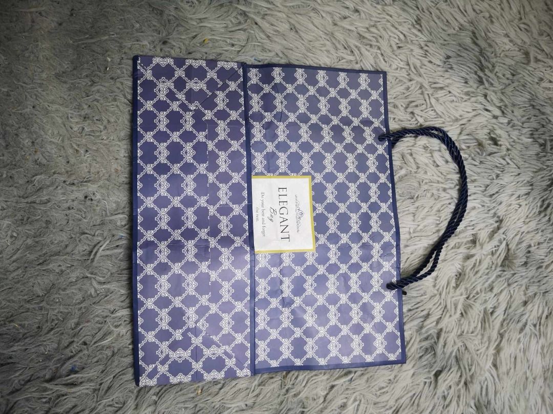 Blue Printed Gift Bag (Category: Gift Baskets & Hampers) located in Santa Cruz. Submitted by jmy_surplus.2 (Listing ID 1364699493, Image 1). Description: Size ; L - 11 W - 12.6 Color ; Blue Type ; Gift Bag Brand ; No brand Material ; Nylon Style ; Blue Printed Gift Bag LR 79 JMY 4.