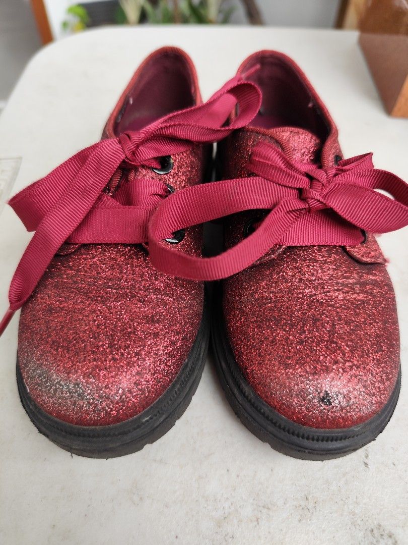 Cat & Jack Red Glitter Shoes (Category: Babies & Kids Fashion) located in Bacoor. Submitted by deedeiadeng (Listing ID 1364642487, Image 2). Description: Cat & Jack Red Glitter Lace Up Shoes. Barely walked in mostly used for photos but has scuffs in front of the shoe. Size 9c RFS Outgrown. Slightly Negotiable. pickup or shipping c/o buyer.