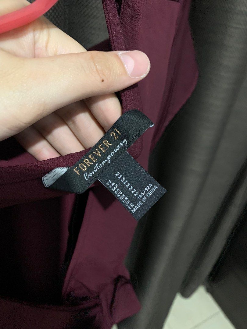 Forever 21 Contemporary Tie Peplum Top (Category: Blouses) located in Mandaluyong City. Submitted by blzstr (Listing ID 1364708248, Image 3). Description: Used once Side zip Color is wine red or burgundy .