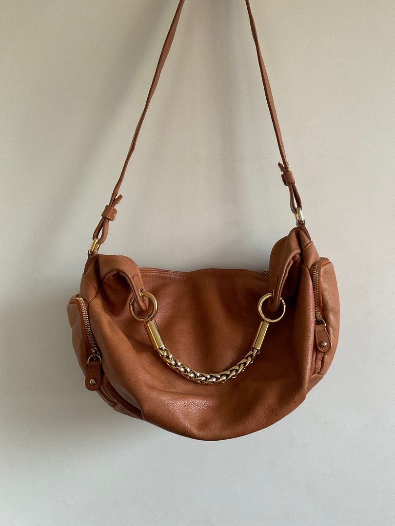 FURL TWO WAY BAG (Category: Luxury Bags & Wallets) located in Davao. Submitted by vaultexchange_ (Listing ID 1364690380, Image 1). Description: Furla with watermarks Orih.