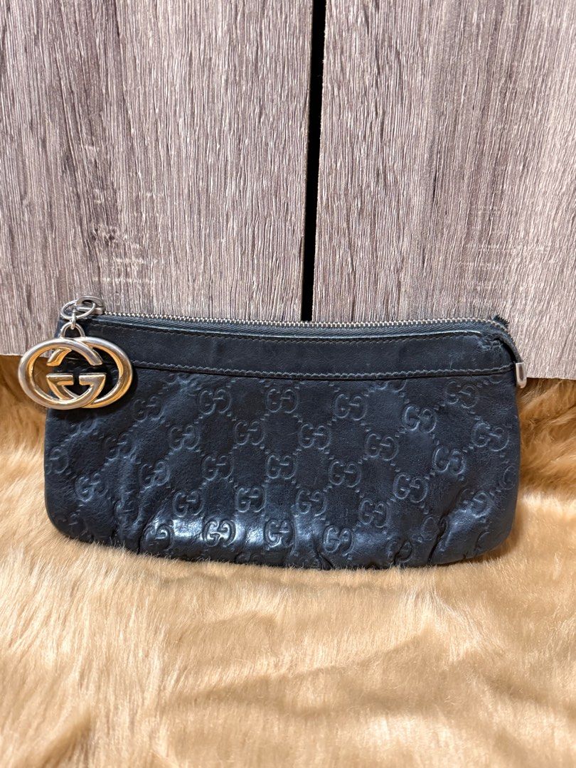 SALE! Gucci Wristlet (Category: Luxury Bags & Wallets) located in Manila. Submitted by iwearclothingph (Listing ID 1364598328, Image 2). Description: Please see pics for the minor flaws. Guaranteed authentic. No other inclusions. .