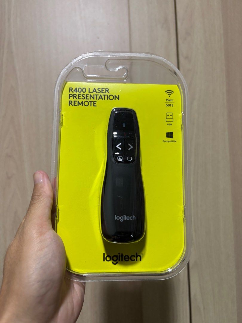 Logitech Presentation Remote Pointer (Category: Office & Business Technology) located in Singapore. Submitted by jctf (Listing ID 1364735364, Image 1). Description: Logitech R400 Remote Presenter and laser pointer.