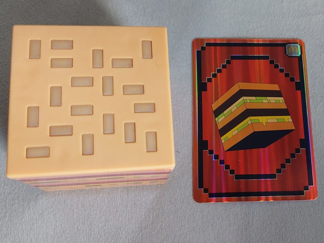 Mcdonald's Minecraft Blind Box Big Mac Crystal (Category: Character Goods) located in Pasig City. Submitted by toydaddyph (Listing ID 1364618461, Image 2). Description: Item is a "Big Mac Crystal", a special item found within a 2025 Minecraft Movie Meal Happy Meal. It's a toy block that resembles Mcdonald's Big Mac This block is one of six (6) collectible characters that can be found in the Happy Meal bag. What you see is what you'll get. Item is
