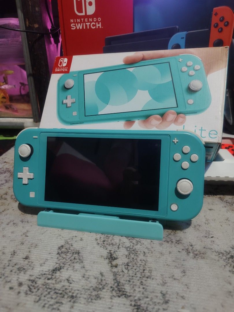 Nintendo Switch (Category: Nintendo) located in Binan City. Submitted by olxph_401981327 (Listing ID 1364588760, Image 3). Description: For Sale or Swap! Package 1: Nintendo Switch Lite with: Box and Charger (no mmc and games) 5k Package 2: Nintendo Switch v2 with: Box Dock Grip Joycons HDMi (no mmc and games) 7500 Package 3: Nintendo Switch OLED with: Box HDMi Charger Dock Joycons Straps Grip (no mmc) pero may dig. games 2ndary acct. only 10k Pa