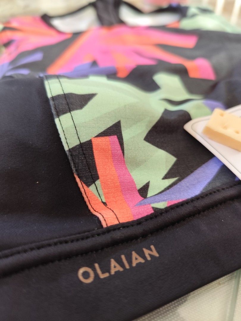 Olaian Surf/Swim Top BNWT (Category: Bikinis & Swimsuits) located in Bacoor. Submitted by deedeiadeng (Listing ID 1364590766, Image 2). Description: Olaian Swim Top High Neck High Back with Zip Pull. With removable quick dry pads. perfect for surfing and other water sports. RFS too small. Slightly negotiable..