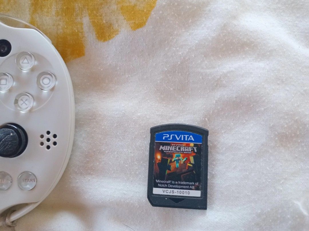 Sony PS Vita - White (Category: PlayStation) located in San Pedro. Submitted by cjnxx11 (Listing ID 1364604307, Image 3). Description: dm me for details inclusions: - minecraft game - sd card - no charger.