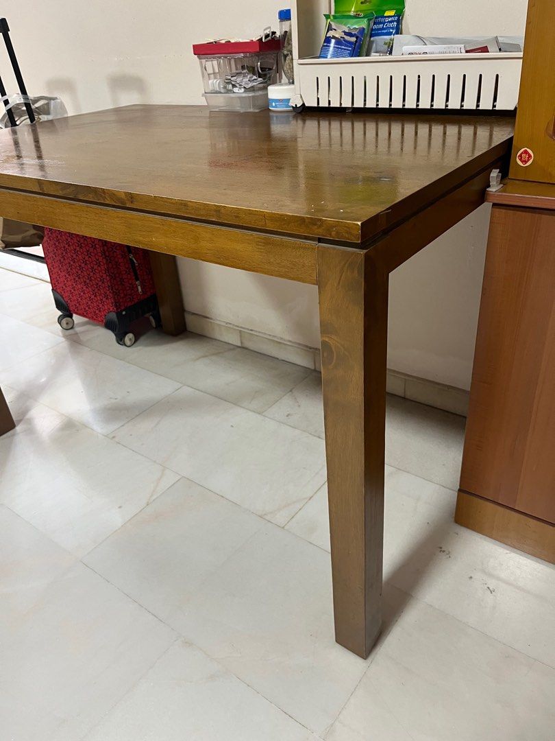 Solid Wood Dining Table (Category: Tables & Sets) located in Singapore. Submitted by xxxvapturexxx (Listing ID 1364651304, Image 2). Description: Length 47” Height 29” Self pickup only.