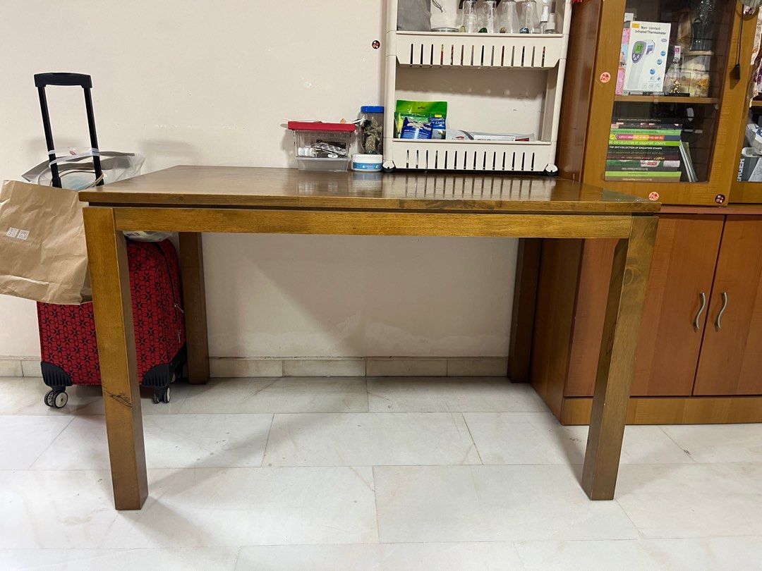 Solid Wood Dining Table (Category: Tables & Sets) located in Singapore. Submitted by xxxvapturexxx (Listing ID 1364651304, Image 3). Description: Length 47” Height 29” Self pickup only.