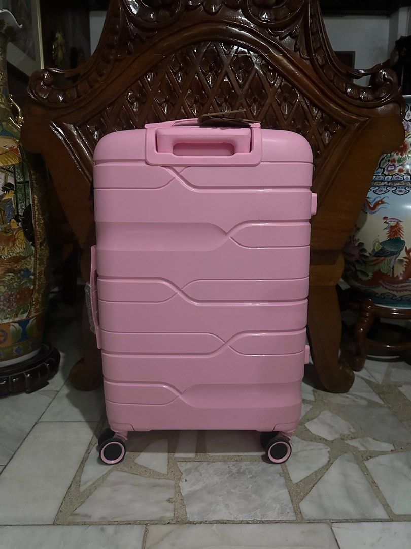 Travel Basic hard case luggage LARGE PINK (Category: Luggage) located in Valenzuela. Submitted by kaelstoypalace (Listing ID 1364643564, Image 3). Description: TSA LOCK AIRPLANE WHEELS.