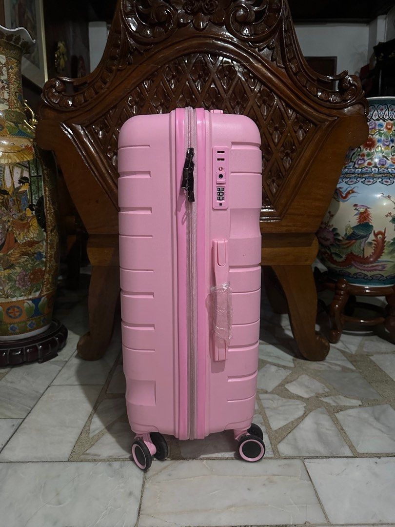 Travel Basic hard case luggage LARGE PINK (Category: Luggage) located in Valenzuela. Submitted by kaelstoypalace (Listing ID 1364643564, Image 2). Description: TSA LOCK AIRPLANE WHEELS.