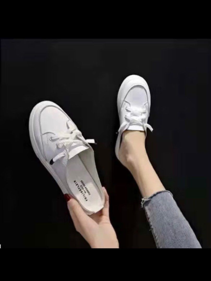 both white slip on & pink jelly sneakers (Category: Sneakers) located in Bacolor. Submitted by annsowee (Listing ID 1364664070, Image 1). Description: 200 both size 7 (24cm).