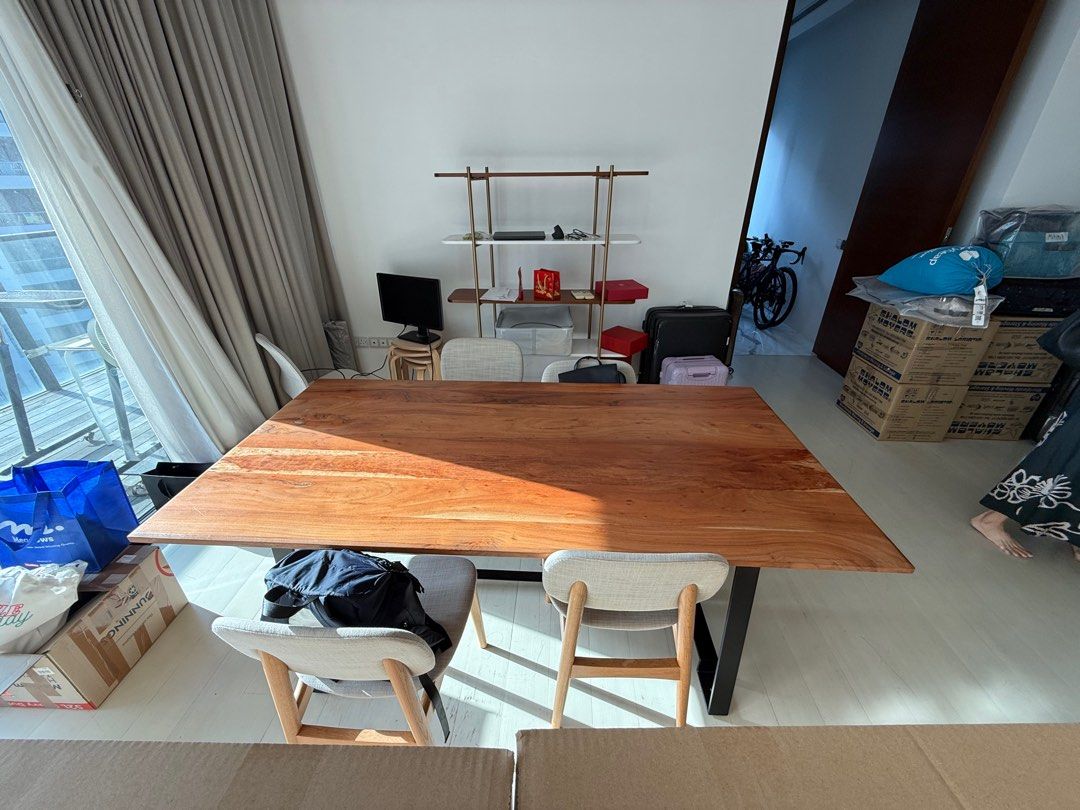 Solid Wood Dining Table (Category: Tables & Sets) located in Singapore. Submitted by kumar_na (Listing ID 1364718532, Image 2). Description: Purchased from FortyTwo - great condition, good solid table - solid piece of wood (not MDF or particle board) 200x100cm https://www.fortytwo.sg/kyros-wingnut-dining-table.html.