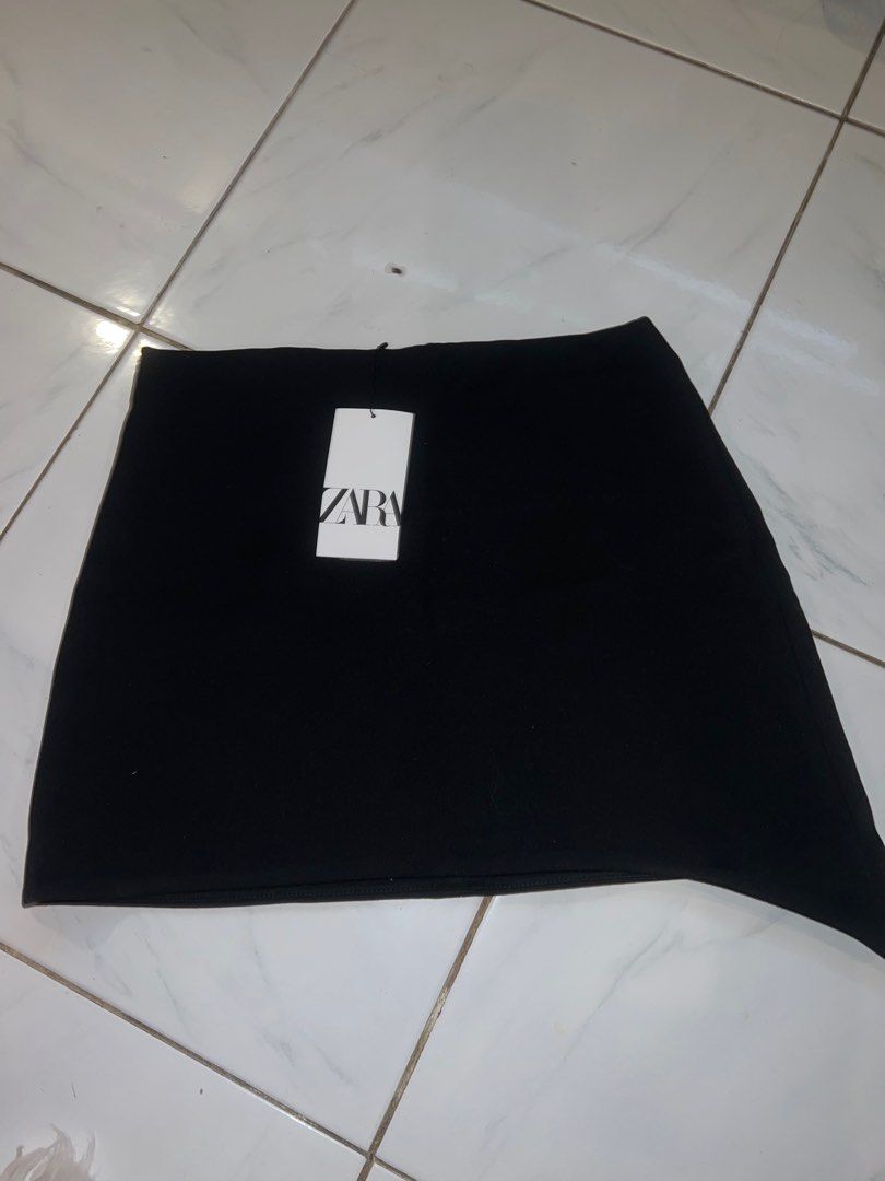 Zara black skirt asymmetrical style (Category: Skirts) located in Pasig City. Submitted by lovedstuff2020 (Listing ID 1364702446, Image 1). Description: ✨ Brand new with tag ❤️ Size M on tag .