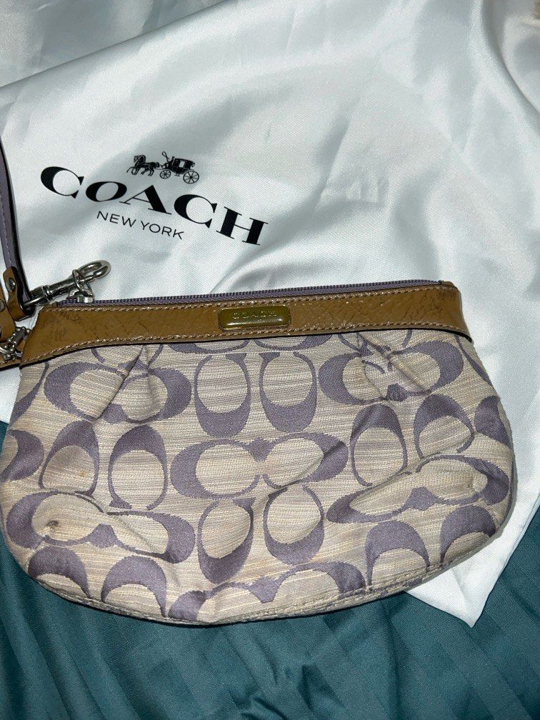 Coach Wristlet (Category: Bags & Wallets) located in Singapore. Submitted by doglover822 (Listing ID 1364896285, Image 1). Description: Old school coach pouch, slight stains , zipper still well functioning .