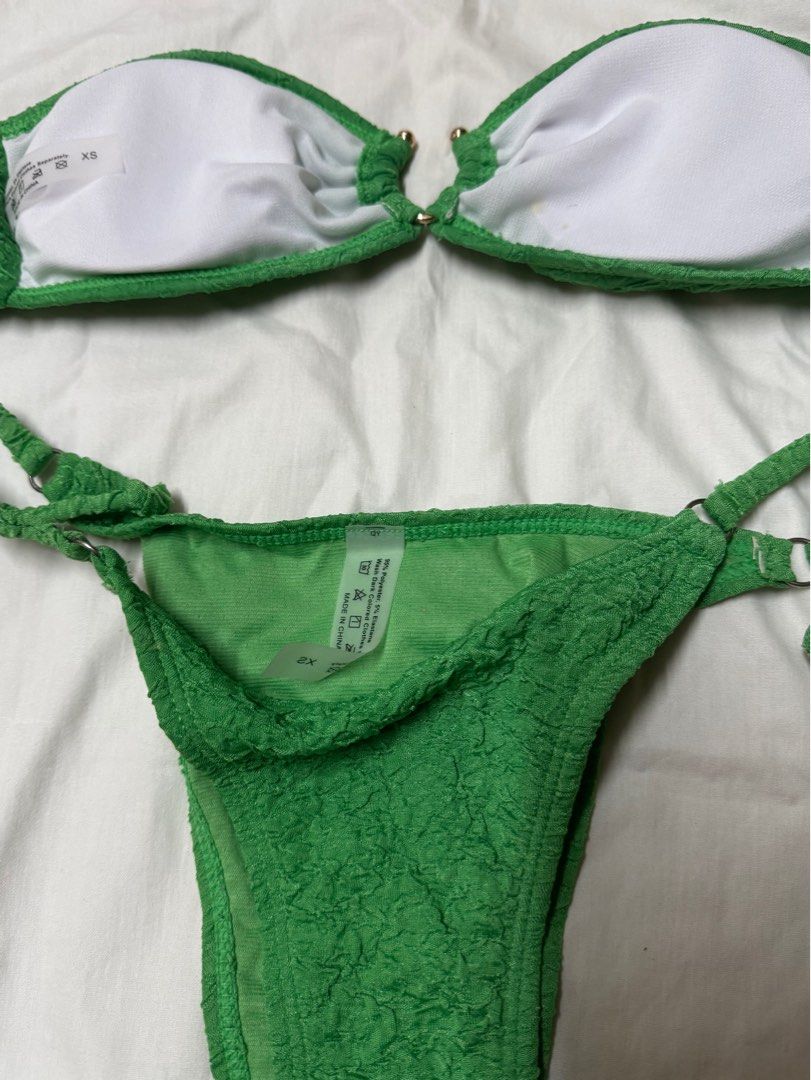 Green Bandeau Swimsuit Bikini (Category: Bikinis & Swimsuits) located in Paranaque City. Submitted by sj_things (Listing ID 1364845410, Image 3). Description: Green Bandeau U-ring padded top with string bottoms in size XS. Please see last pictures for size reference only worn once to fit .