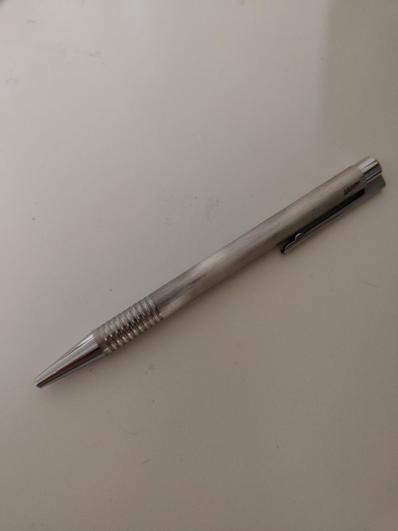 Lamy Logo Ballpoint Pen (Category: Stationery & School Supplies) located in Makati City. Submitted by shopsaleph (Listing ID 1364800601, Image 2). Description: LAMY LOGO BALLPOINT PEN Clear form, great diversity. Its timeless design and high functionality turn the LAMY logo into a dependable companion for every writing occasion. Its clip and push-button merge into one integrated organic unit. At the same time, the purist design clarity of the ser