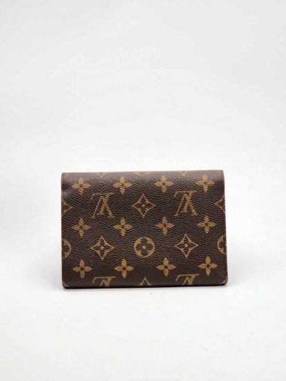 Louis Vuitton (Category: Luxury Bags & Wallets) located in Pasig City. Submitted by emashopaholic (Listing ID 1364821471, Image 2). Description: Preloved Louis Vuitton Monogram Medium wallet Fits a passport holder No inclusions No issues In excellent condition Only ₱17,500 Locatio : Pasig Shipping c/o buyer MOP: Gcash/BDO/BPi.