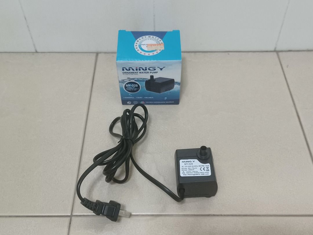 Mingy, Submersible, Water Pump, MY-028, 4 Watts, New (Category: Homes & Other Pet Accessories) located in Singapore. Submitted by pinkpuffin (Listing ID 1364765591, Image 2). Description: Self collect at Redhill MRT. Mingy, Submersible, Water Pump, MY-028, 4 Watts, New. Rated V: 220V/240V. Rated power: 4W. Maximum lift: 0.75m. Maximum flow: 280L/h. Dimensions ( LxBxH ): 48 x 46 x 34mm Water nozzle diameter : 7 mm Water nozzle height: 10 mm Power 