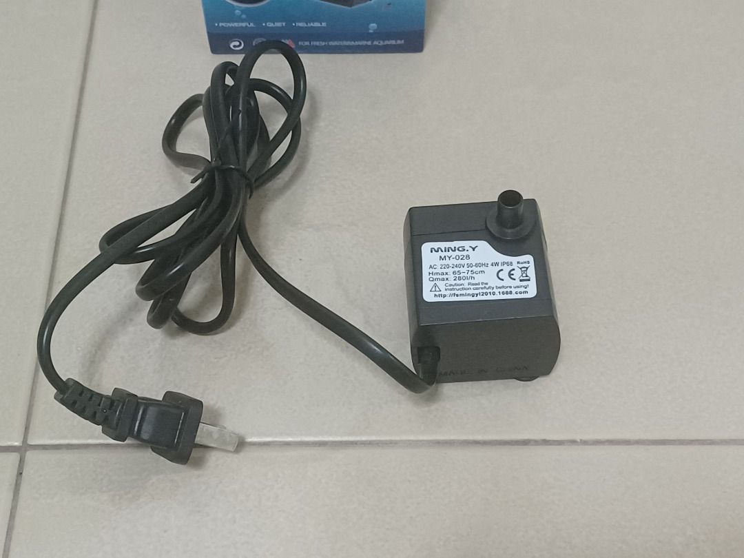 Mingy, Submersible, Water Pump, MY-028, 4 Watts, New (Category: Homes & Other Pet Accessories) located in Singapore. Submitted by pinkpuffin (Listing ID 1364765591, Image 1). Description: Self collect at Redhill MRT. Mingy, Submersible, Water Pump, MY-028, 4 Watts, New. Rated V: 220V/240V. Rated power: 4W. Maximum lift: 0.75m. Maximum flow: 280L/h. Dimensions ( LxBxH ): 48 x 46 x 34mm Water nozzle diameter : 7 mm Water nozzle height: 10 mm Power 