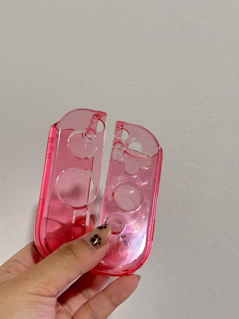 Nintendo Switch OLED Pink Transparent Case (Category: Nintendo) located in Manila. Submitted by sheineclutters (Listing ID 1364765286, Image 3). Description: Dockable Switch Case Transparent for Nintendo Switch OLED (Ultra Thin Design Anti-Scratch) RFS. Already have another case I use Only used a couple of times but has few scratches which is how I got it ;(( But other than that no broken parts This is dockable. :”> Loc: Baguio/Manila (Up to disc