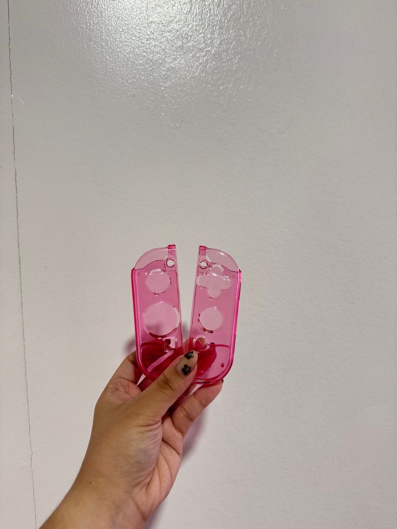 Nintendo Switch OLED Pink Transparent Case (Category: Nintendo) located in Manila. Submitted by sheineclutters (Listing ID 1364765286, Image 2). Description: Dockable Switch Case Transparent for Nintendo Switch OLED (Ultra Thin Design Anti-Scratch) RFS. Already have another case I use Only used a couple of times but has few scratches which is how I got it ;(( But other than that no broken parts This is dockable. :”> Loc: Baguio/Manila (Up to disc