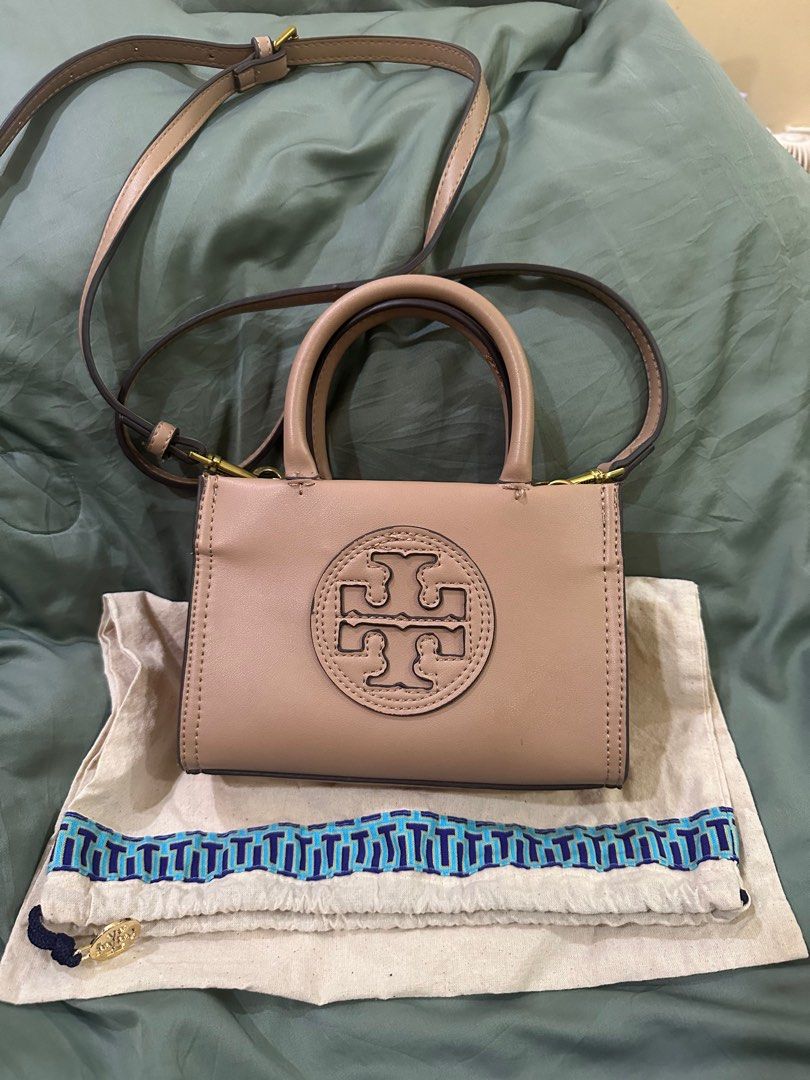 Tory Burch Bag (Category: Luxury Bags & Wallets) located in Cavite. Submitted by eunice.rynx (Listing ID 1364847105, Image 1). Description: Tory Burch Mini Ella logo-appliqué tote bag Description: blush pink faux leather signature Double T motif two rolled top handles detachable shoulder strap magnetic fastening main compartment internal zip-fastening pocket full lining gold-tone hardware Composition Outer: Bio-Tex™ 100% Lining: Cotton 100%.