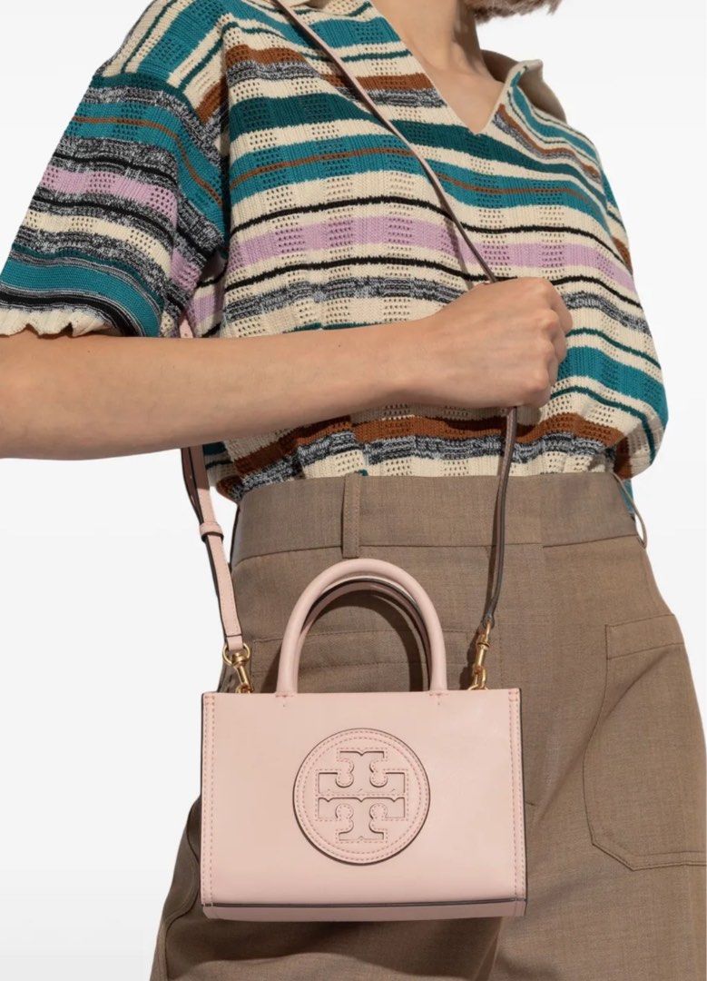Tory Burch Bag (Category: Luxury Bags & Wallets) located in Cavite. Submitted by eunice.rynx (Listing ID 1364847105, Image 2). Description: Tory Burch Mini Ella logo-appliqué tote bag Description: blush pink faux leather signature Double T motif two rolled top handles detachable shoulder strap magnetic fastening main compartment internal zip-fastening pocket full lining gold-tone hardware Composition Outer: Bio-Tex™ 100% Lining: Cotton 100%.