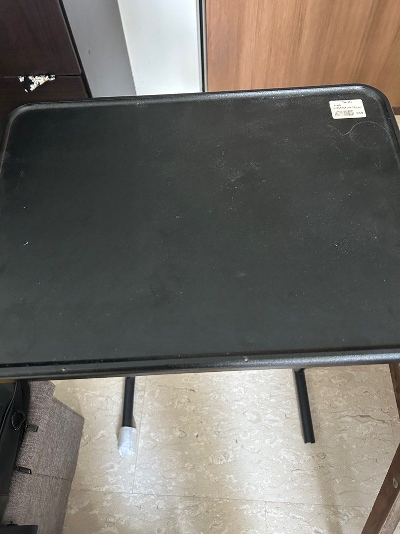Turtle- Foldable table (Category: Tables & Sets) located in Singapore. Submitted by realenacah03049 (Listing ID 1364822778, Image 2). Description: In good condition. Size: 60-70cm Can pick up in The Eden Condo.