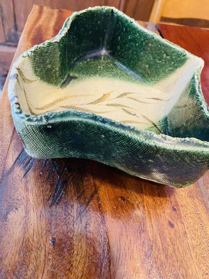 Wabi- sabi Handmade stoneware Decorative Dish (Category: Vases & Decorative Bowls) located in Bulacan. Submitted by orange.locker (Listing ID 1364777722, Image 2). Description: Asymmetrical design with green glaze and yellow tones Perfect for holding jewelry or serving candies Brings both function and art to your space.